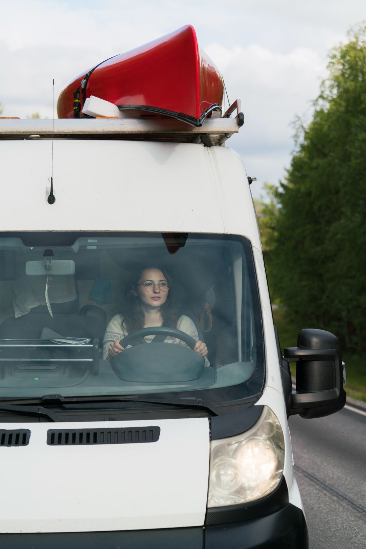 Woman driving a camper van