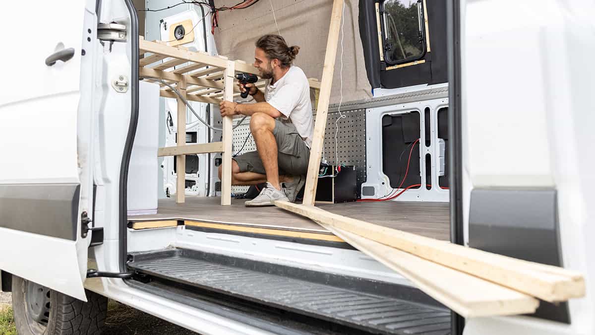 Person Building A DIY Van Conversion