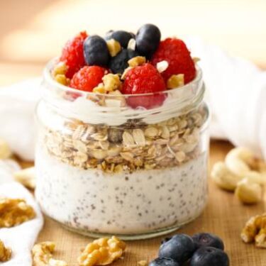 overnight oats in a mason jar, topped with fruit