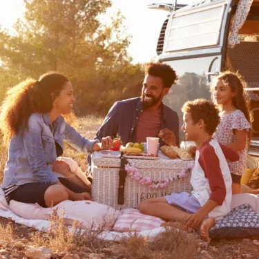 Family camping in a van