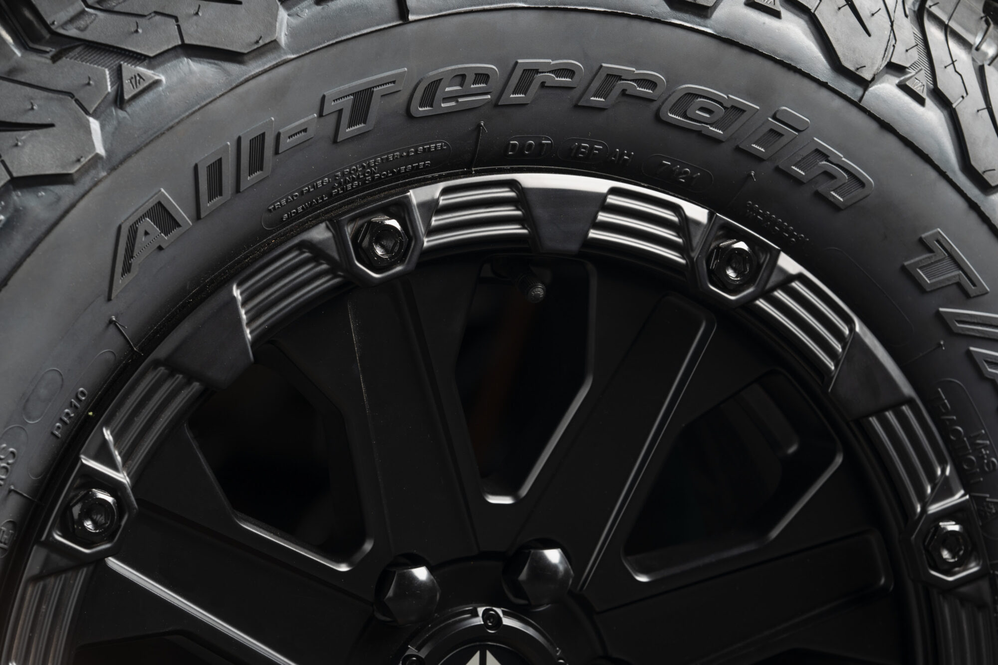 Close up of an Apex Wheel that says "All Terrain"
